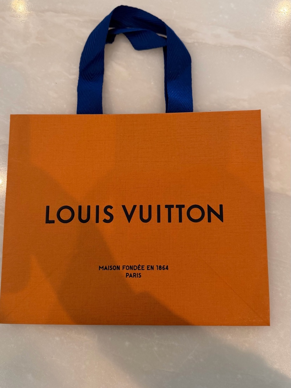 Louis Vuitton Orange Shopping Bag with Blue Handles